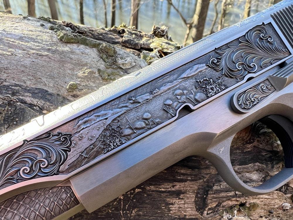 Win a Colt 1911 .45 ACP D-Day Commemorative AAA Engraved Firearm!